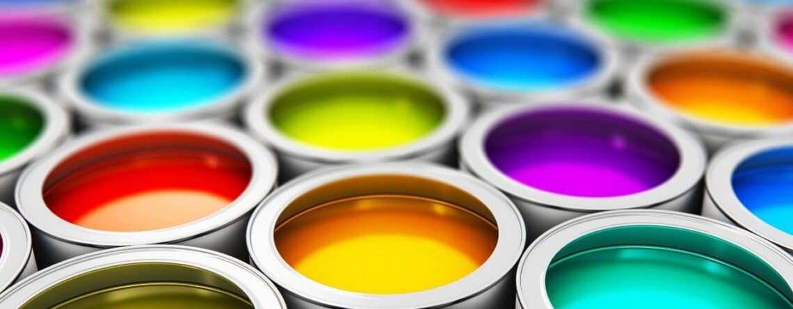 Open paint cans filled with bright colours under a navy banner reading IP DECISIONS